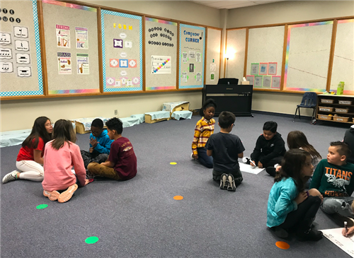 Students Practice Identifying Composers at a 2019-2020 Club Meeting 